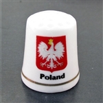 This porcelain thimble has the Polish eagle against a red background. Beautiful collector's item. Poland on one side and Polska on the reverse.