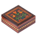 Inlaid Floral Box. This box features a brightly colored floral design accented with metal inlay and set against a carved, burned texture background.