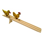 This is a very old and traditional folk racing game.  The race is based on a simple set of ideas....a wooden incline, gravity and two wooden figures.  Set the chicken and the duck at the top of the ramp, let them go at the same time and watch which one re
