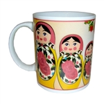 This attractive ceramic mug features a set of Russian Matrushka dolls.