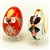 Deluxe wooden Easter eggs from Poland.  Hand painted set featuring Krakow boy and girl in their colorful traditional costumes.