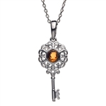 Beautiful sterling silver and amber pendant.  Key size is approx. 1" x .25".